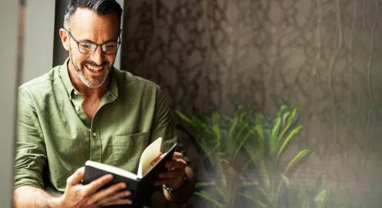 Man reading a published book
