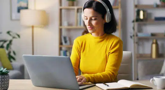 Author working on a laptop